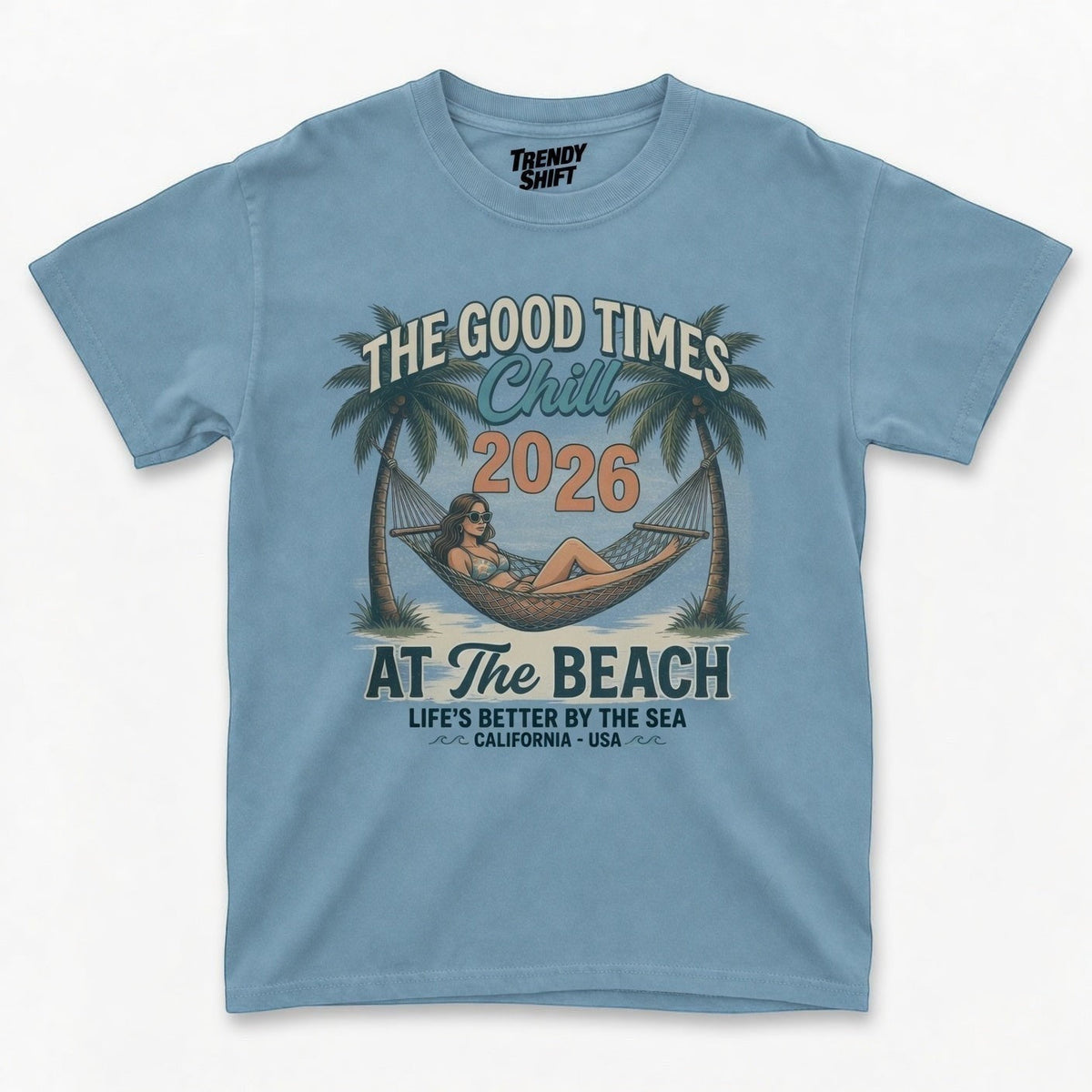 light blue retro graphic t-shirt featuring a palm tree hammock beach scene and summer text
