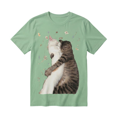  sage green 100% cotton t-shirt featuring a graphic illustration of two cats hugging among wildflowers.