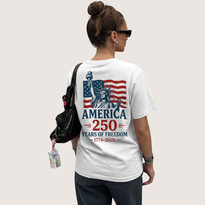  white cotton unisex t-shirt featuring a Statue of Liberty and American flag 250th anniversary graphic.